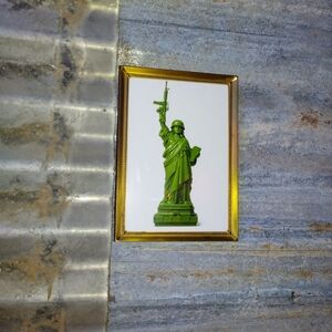 Lady Liberty Plastic Army Man Framed Art Print By Neon Nicho